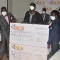 Joshua-Cheptegei-with-his-two-dummy-cheques